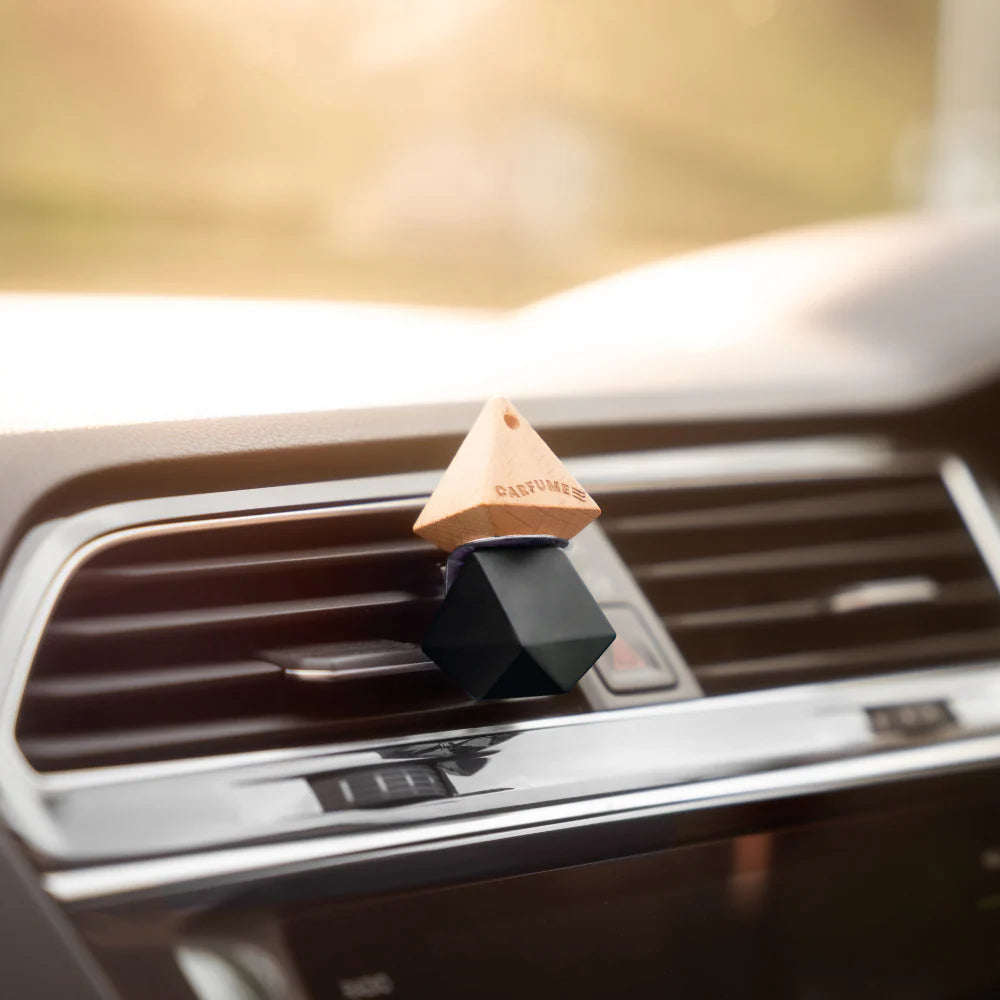 Car air freshener in a car's vent carfume victory scent
