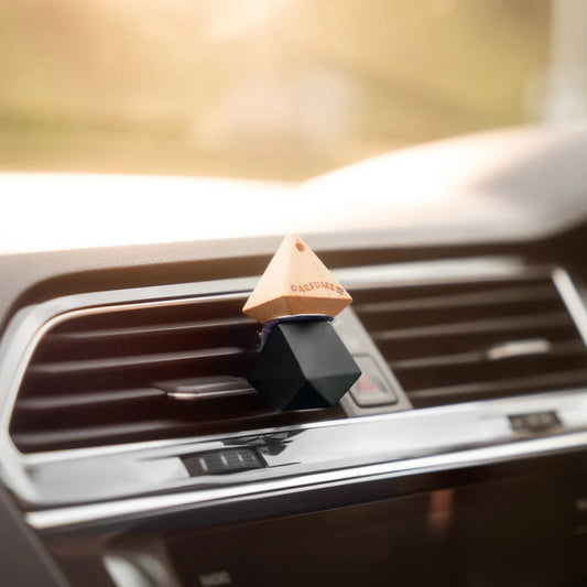Car air freshener in a car's vent carfume victory scent