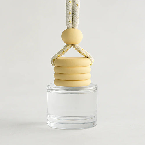 Clear glass bottle rope on a light gray background